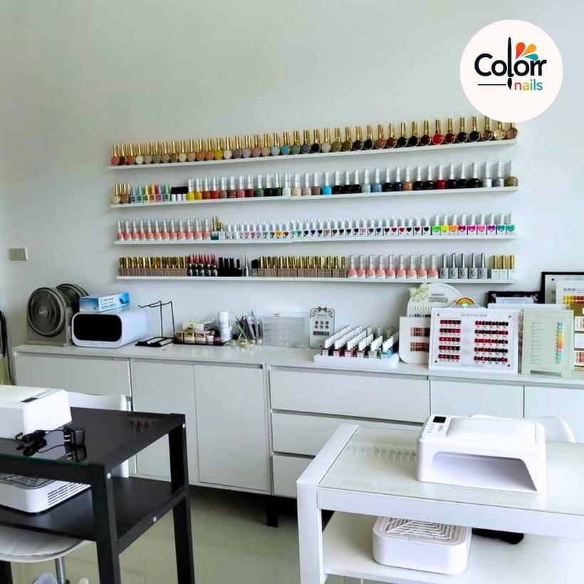 Wall of nail polish colours inside the studio