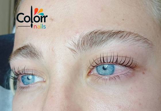 Close-up of eyelash extensions on blue eyes